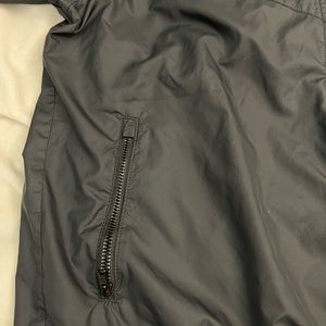 Black Nike wind breaker